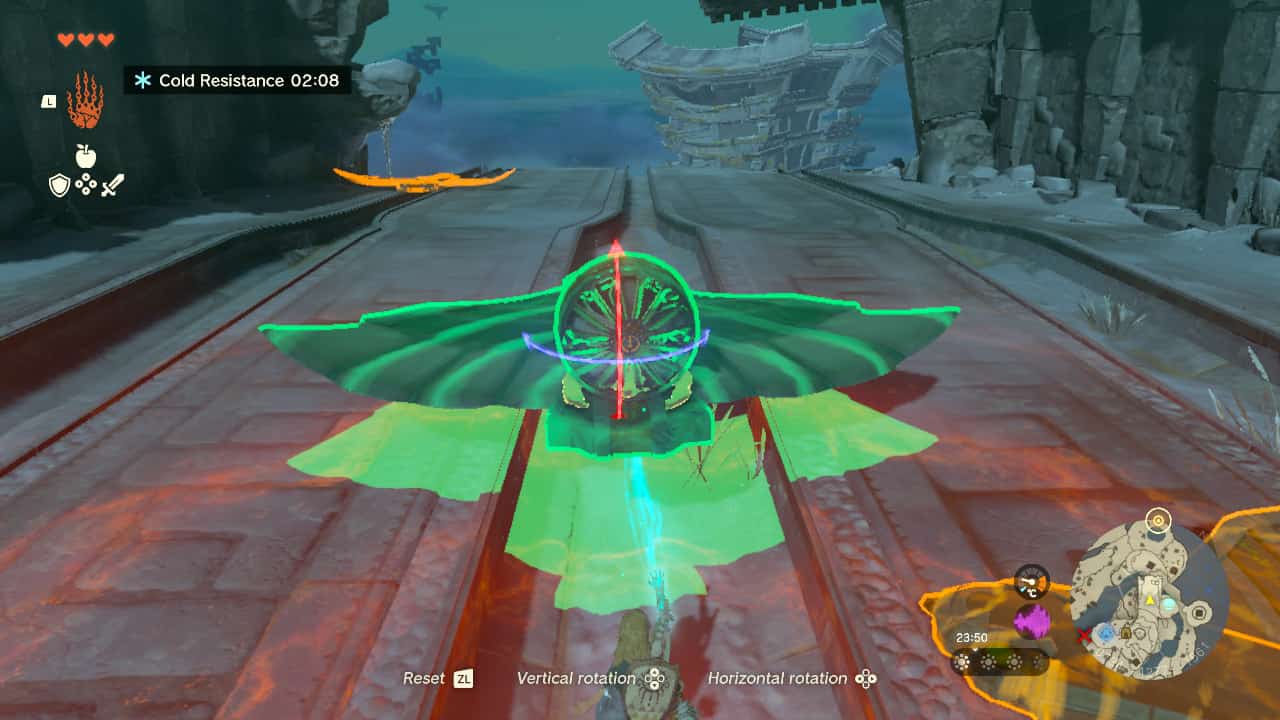 Tears of the Kingdom crafting: Link using Ultrahand to attach a fan to a glider.