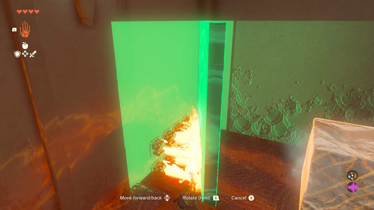 Tears of the Kingdom Kiuyoyou Shrine: Link using Ultrahand to block fire with a large stone slab.