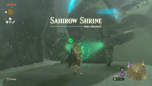 Tears of the Kingdom Sahirow Shrine: Link running up to a Shrine. A message reads: "Sahirow Shrine - Hebra Mountains".