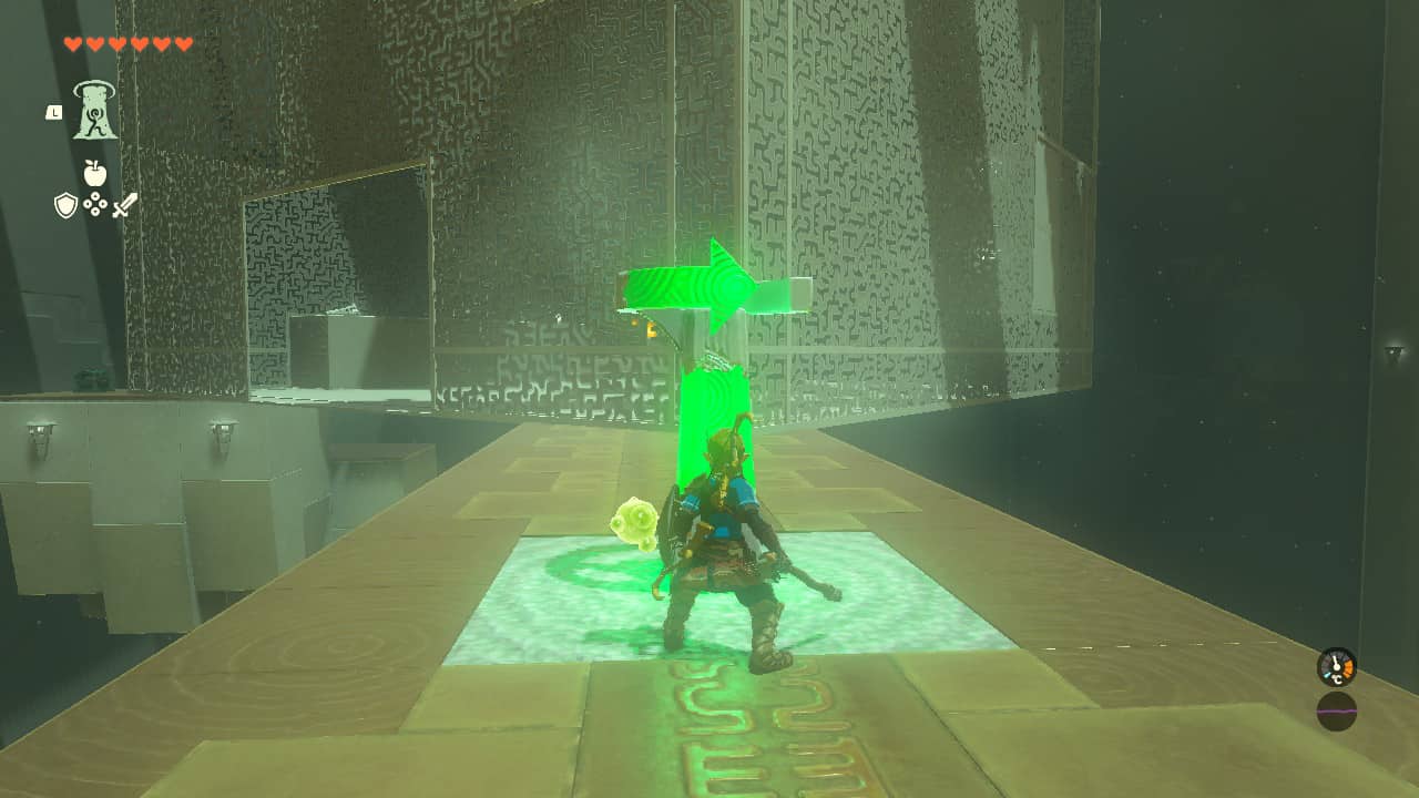 Tears of the Kingdom Domizuin Shrine: Link rotating a large metal cage after hitting a switch in front of him.