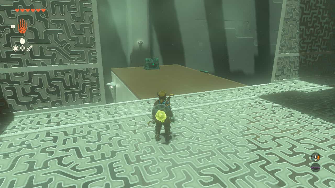Tears of the Kingdom Domizuin Shrine: Link looking at a chest on a platform outside of a metal cage he is in.