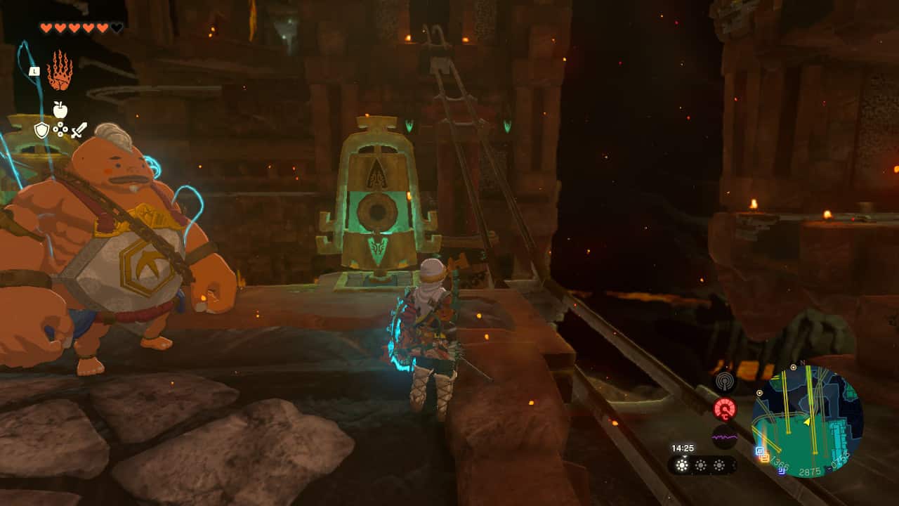 Tears of the Kingdom Fire Temple: Link and Yunobo next to a bell-shaped switch controlling a minecart track.