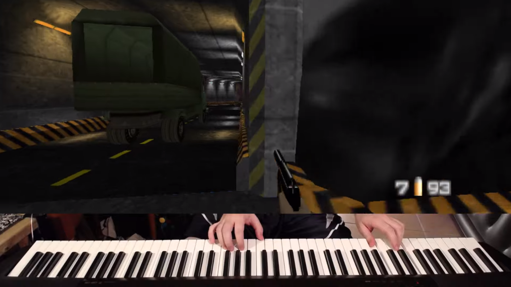 Watch this man play GoldenEye with a piano