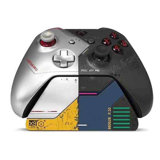An Xbox controller with an additional controller placed on top, enabling enhanced gameplay.