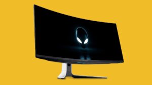 Alienware AW3423DW monitor on yellow background
