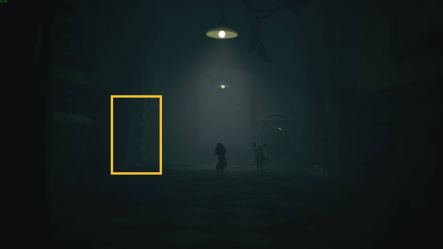 Two characters walk through a dim hallway in All Little Nightmares 3, approaching a mirror puzzle under a hanging light