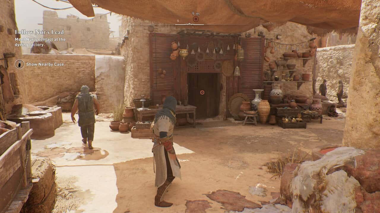 Assassin's Creed Mirage - Nur's contact location at the dyeing factory entrance.