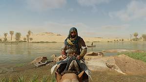Assassin's Creed Mirage - Basim on camel looking at the screen.