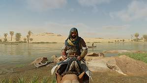 Assassin's Creed Mirage - Basim on camel looking at the screen.