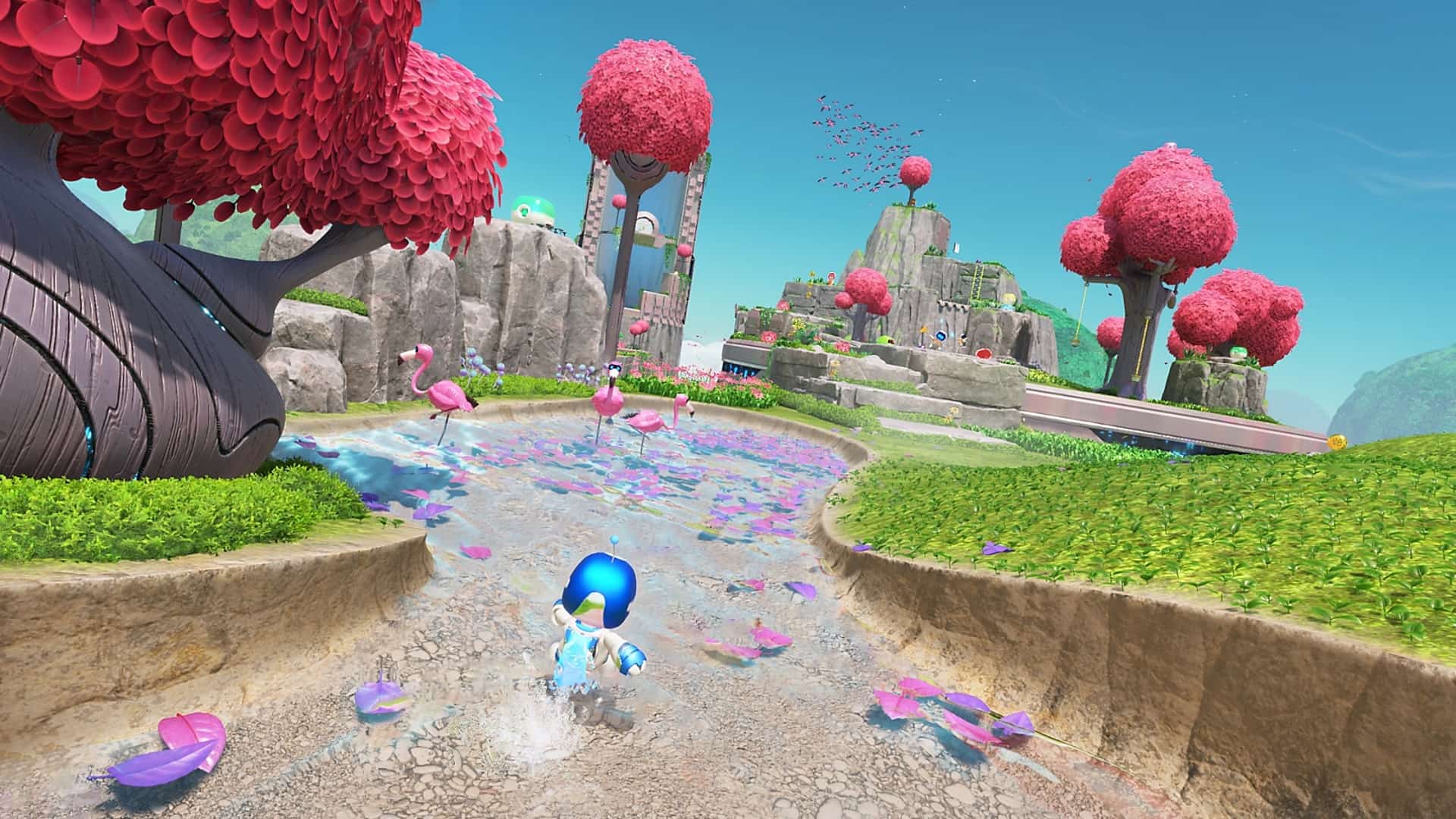 Gameplay scene from Astro Bot on PS5 showing colorful landscape