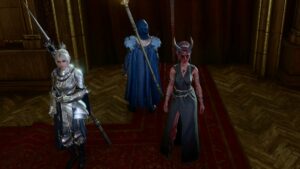 A group of women in armor standing in a sinister hallway.