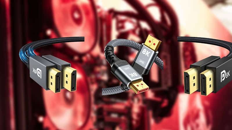 Three HDMI cables with varying connectors against a blurred background of computer hardware, including the best DisplayPort cable.