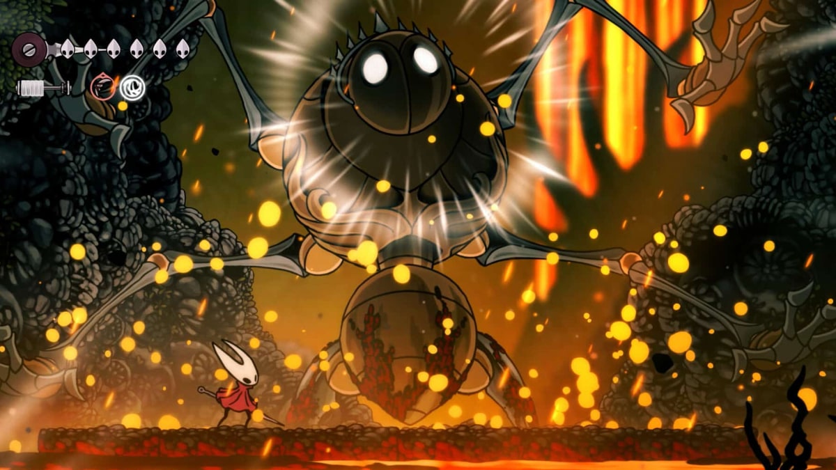 Hornet faces a giant mechanical spider boss in a fiery cavern filled with molten light in Hollow Knight Silksong