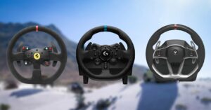 Three racing steering wheels in front of a mountain, perfect for Forza enthusiasts.