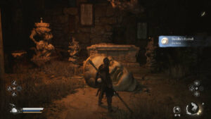 Picture of the Buddha eyeballs item from Black Myth Wukong inside a dark cave area.