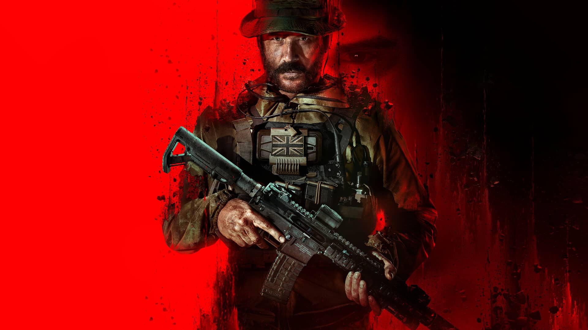 A soldier holding a gun in front of a red background.