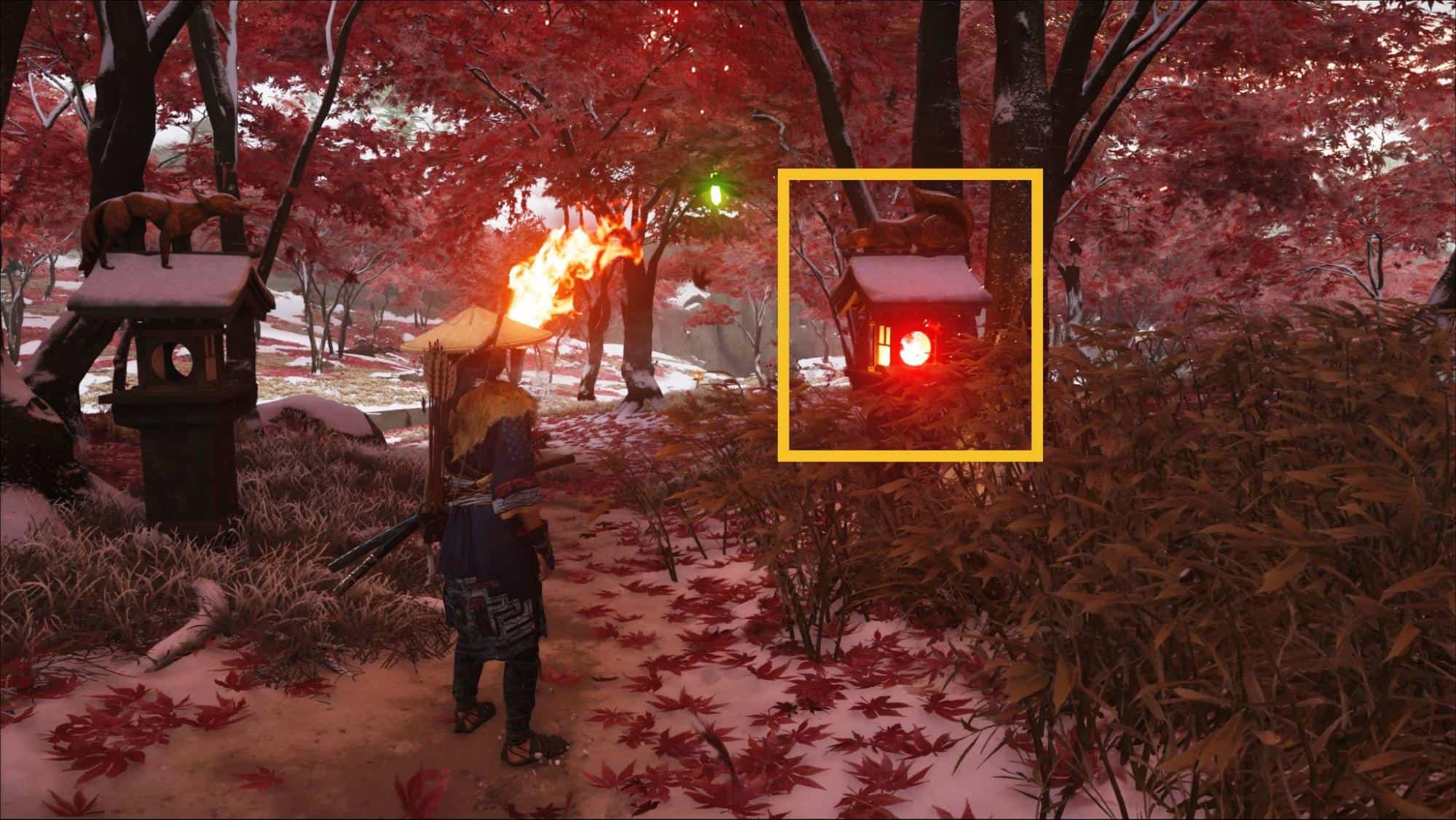Player igniting the crouching fox lantern to unlock the Closed-Off Building in Ghost of Yotei