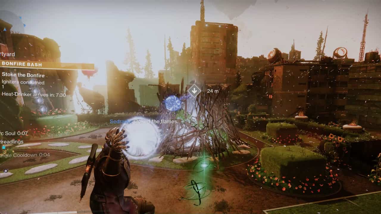 Destiny 2 Solstice Event Card challenges: A Guardian throws an ingniter into the bonfire.