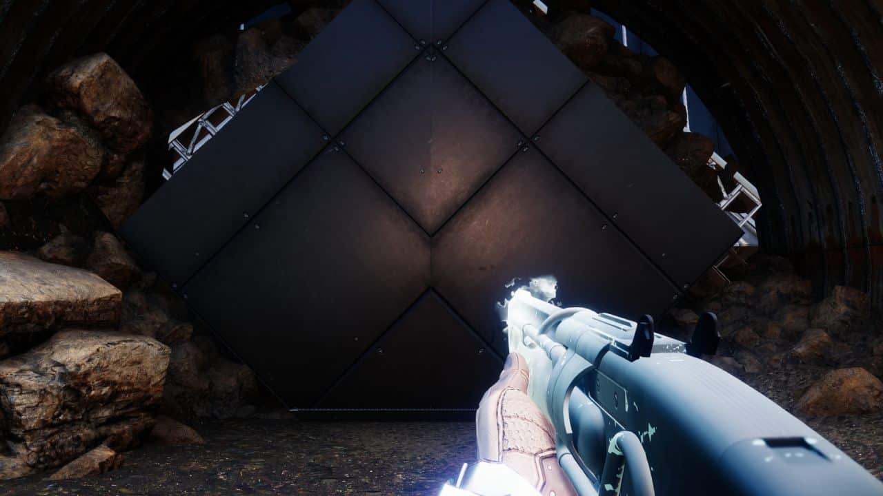 Destiny 2 new dungeon: A Guardian stands outside the doors to a Warmind bunker in the Cosmodrome.