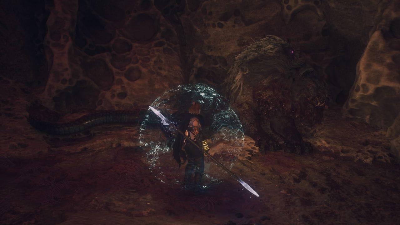 Dragons Dogma 2 Sunstone Farm: Shielded player fighting a Gorechimera at the base of a mountain.