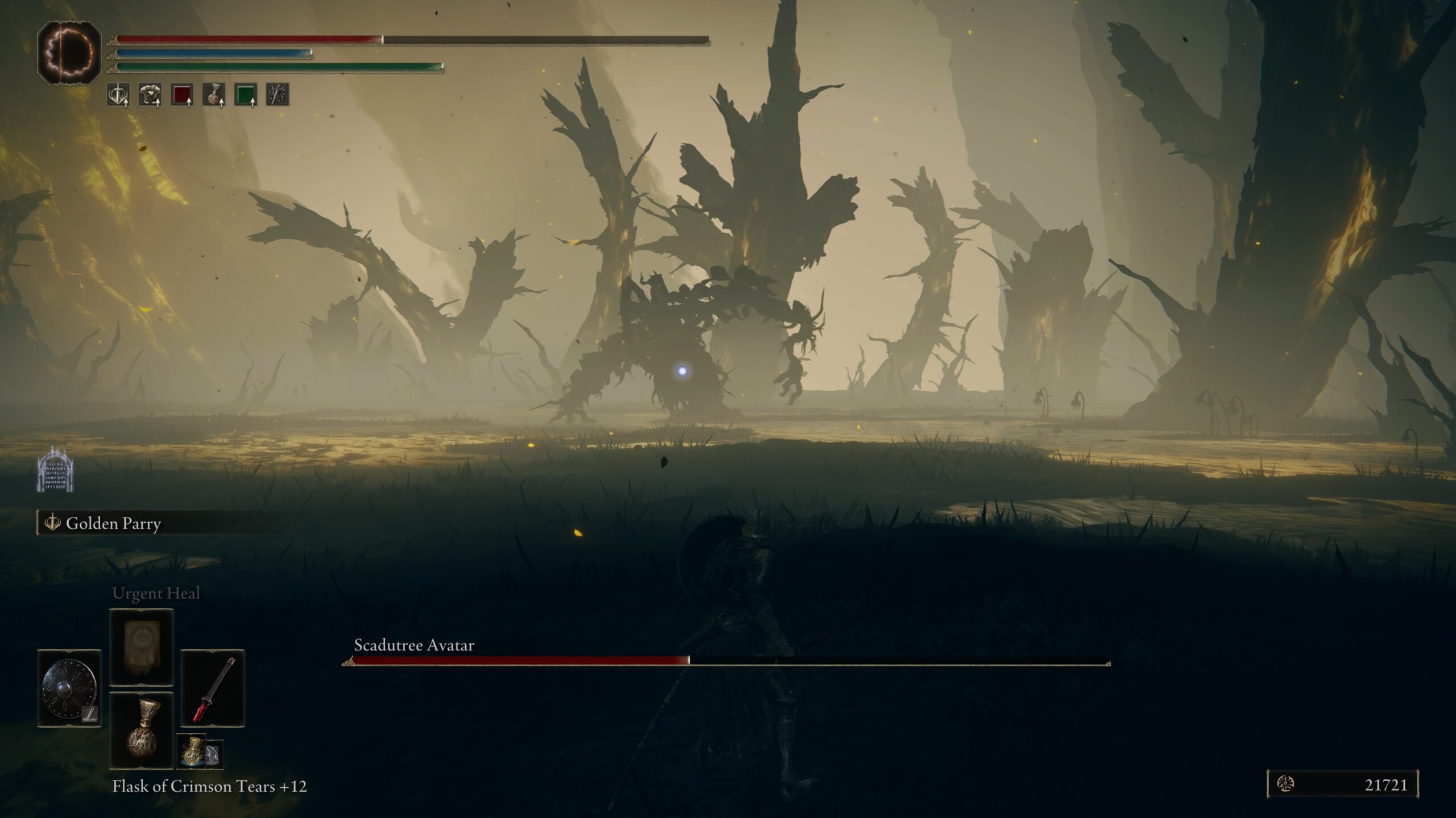 elden ring shadow of the erdtree how to beat the scadutree avatar - a large tree moves in the distance in boggy water