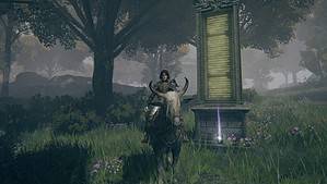 Elden Ring map fragments: our character sits on a horse next to a stele where a map fragment is.