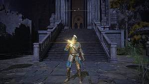 elden ring incantations - a knight's hand glows gold using magic