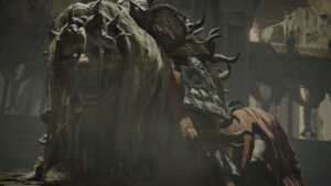 elden ring divine beast dancing lion - a monster lion head with blue eyes look at the camera