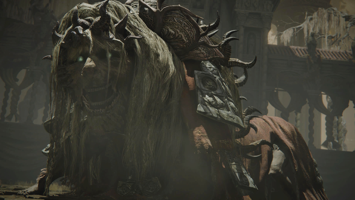 elden ring divine beast dancing lion - a monster lion head with blue eyes look at the camera