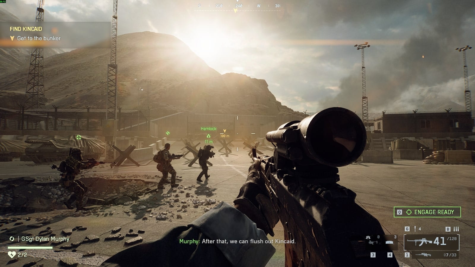 Player aiming down sights while approaching a bunker with squadmates during the “Find Kincaid” mission in Battlefield 6