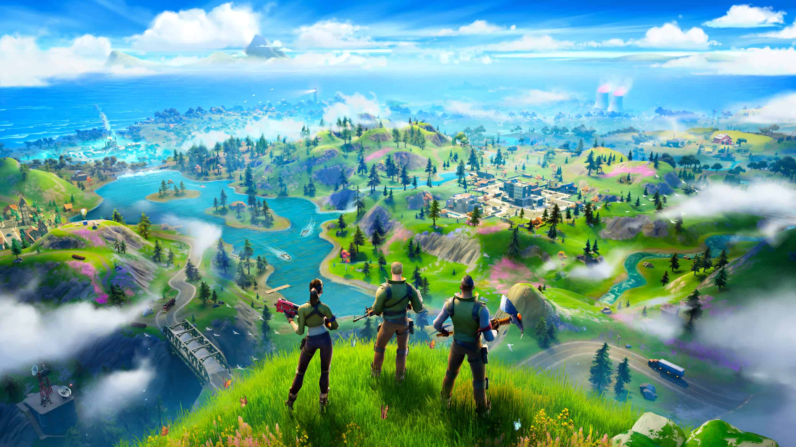 Three characters overlooking a vibrant, lush video game landscape with rivers, fields, and distant towns under a clear blue sky.