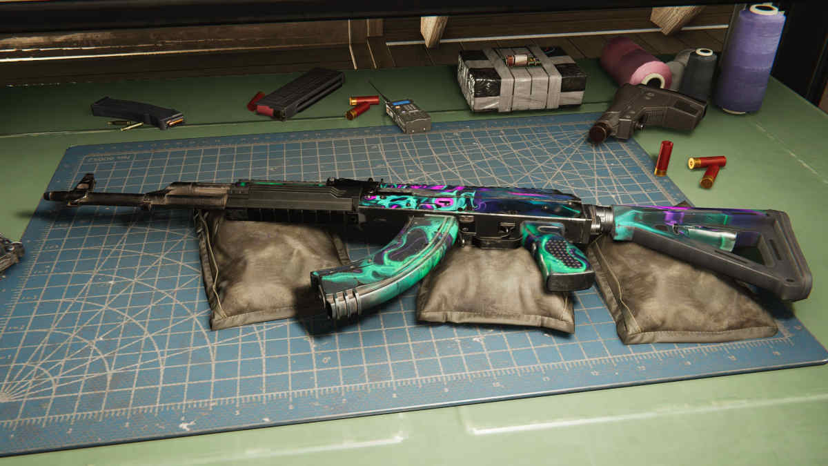 Frozen Vortex One Human: a picture of an AK on a weapon bench in a game.
