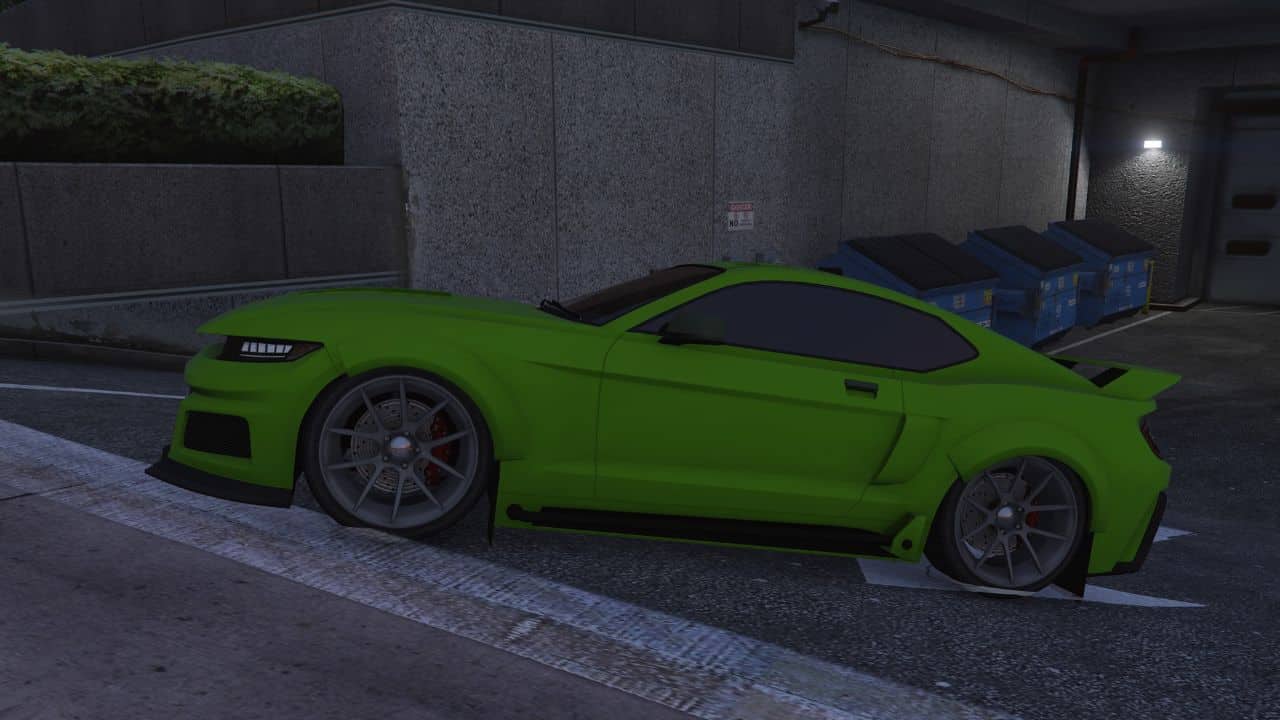 A green mustang (Vapid Dominator GTX) parked in a parking lot.