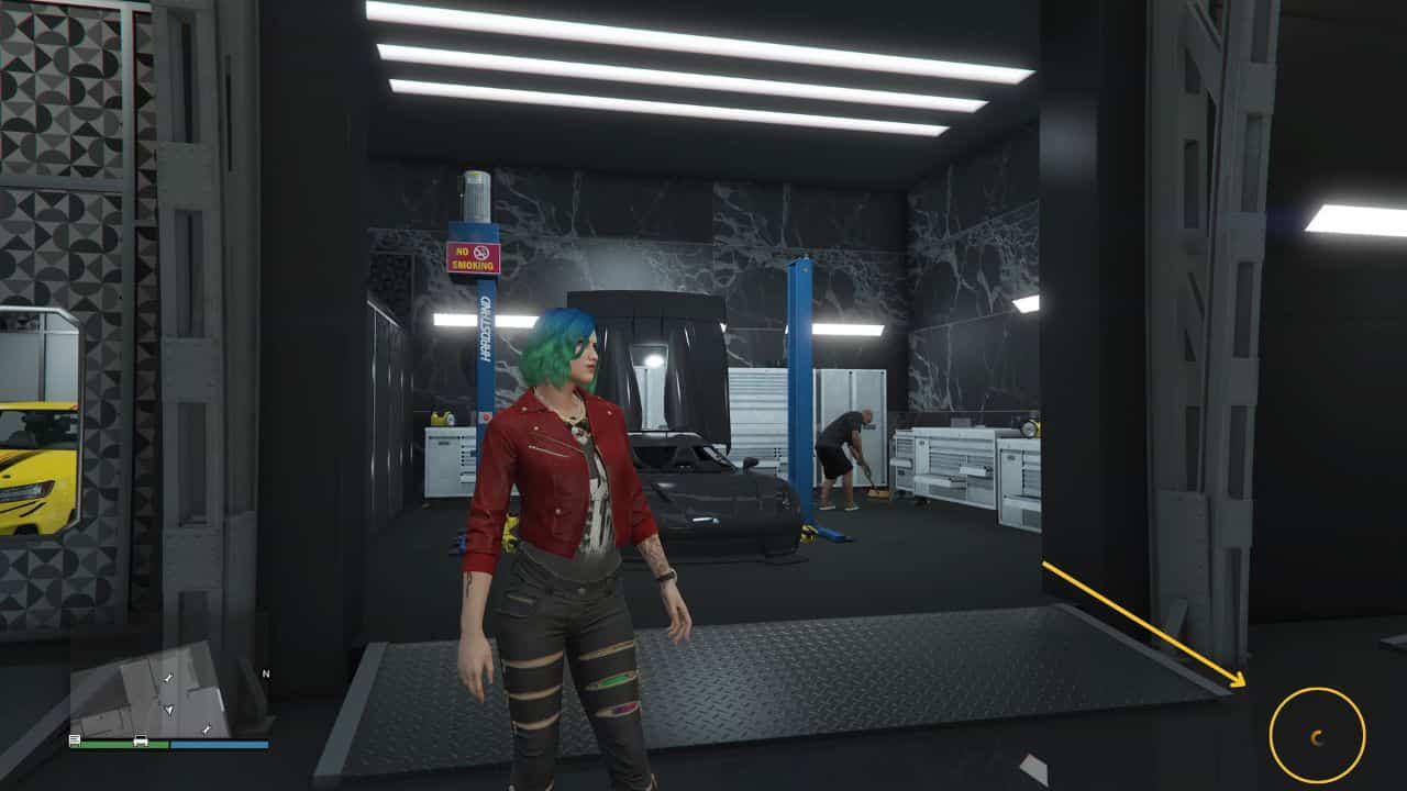 GTA V how to save: Player standing in garage waiting for game to auto save