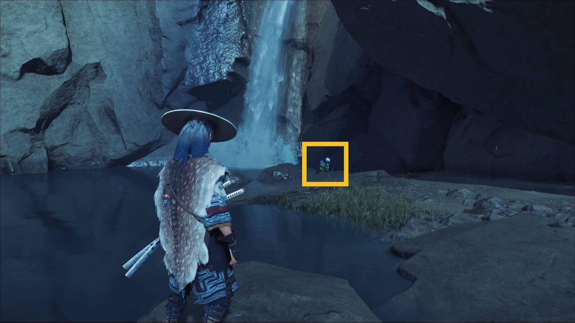Player finding a blue flower by the waterfall during the A Flower for Your Thoughts quest in Ghost of Yotei