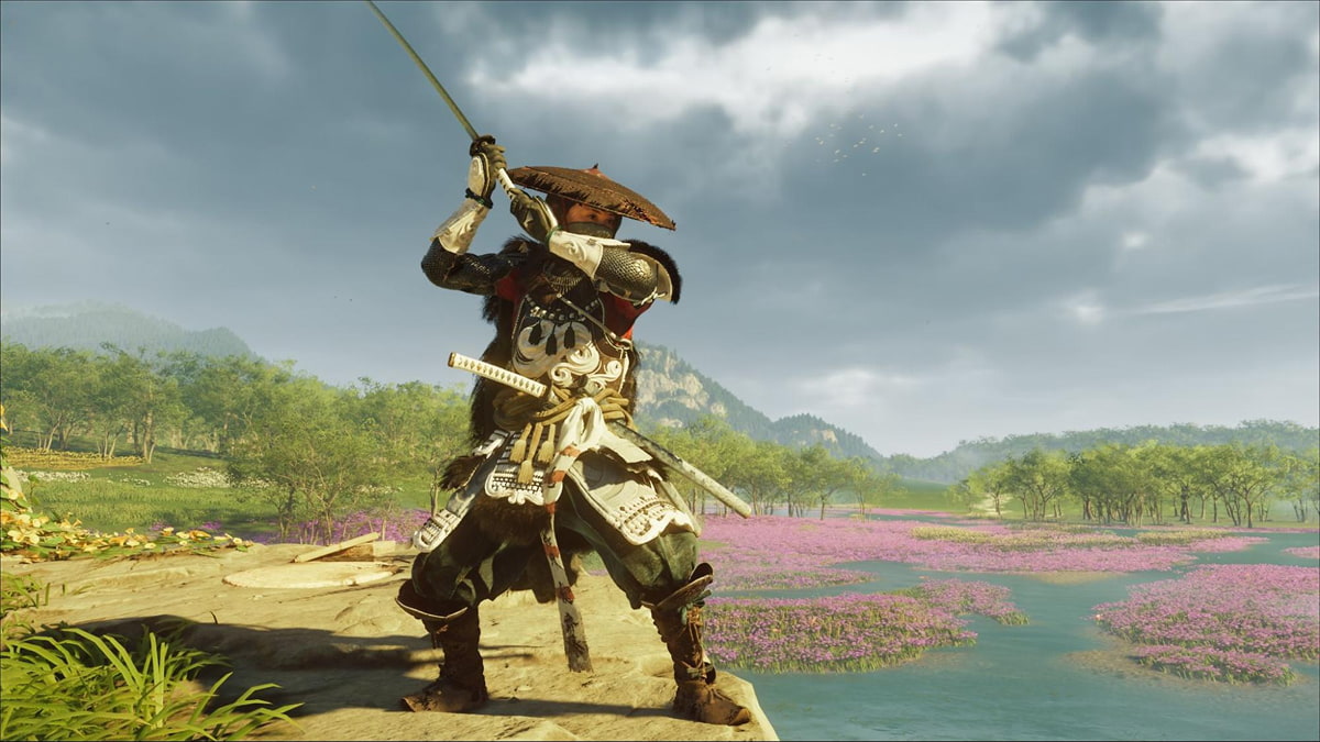 Warrior wearing the Armor of the Undying preparing to strike in Ghost of Yotei