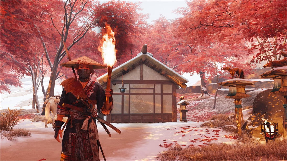 Player approaching the Closed-Off Building in Ghost of Yotei, surrounded by fox lanterns and red autumn trees