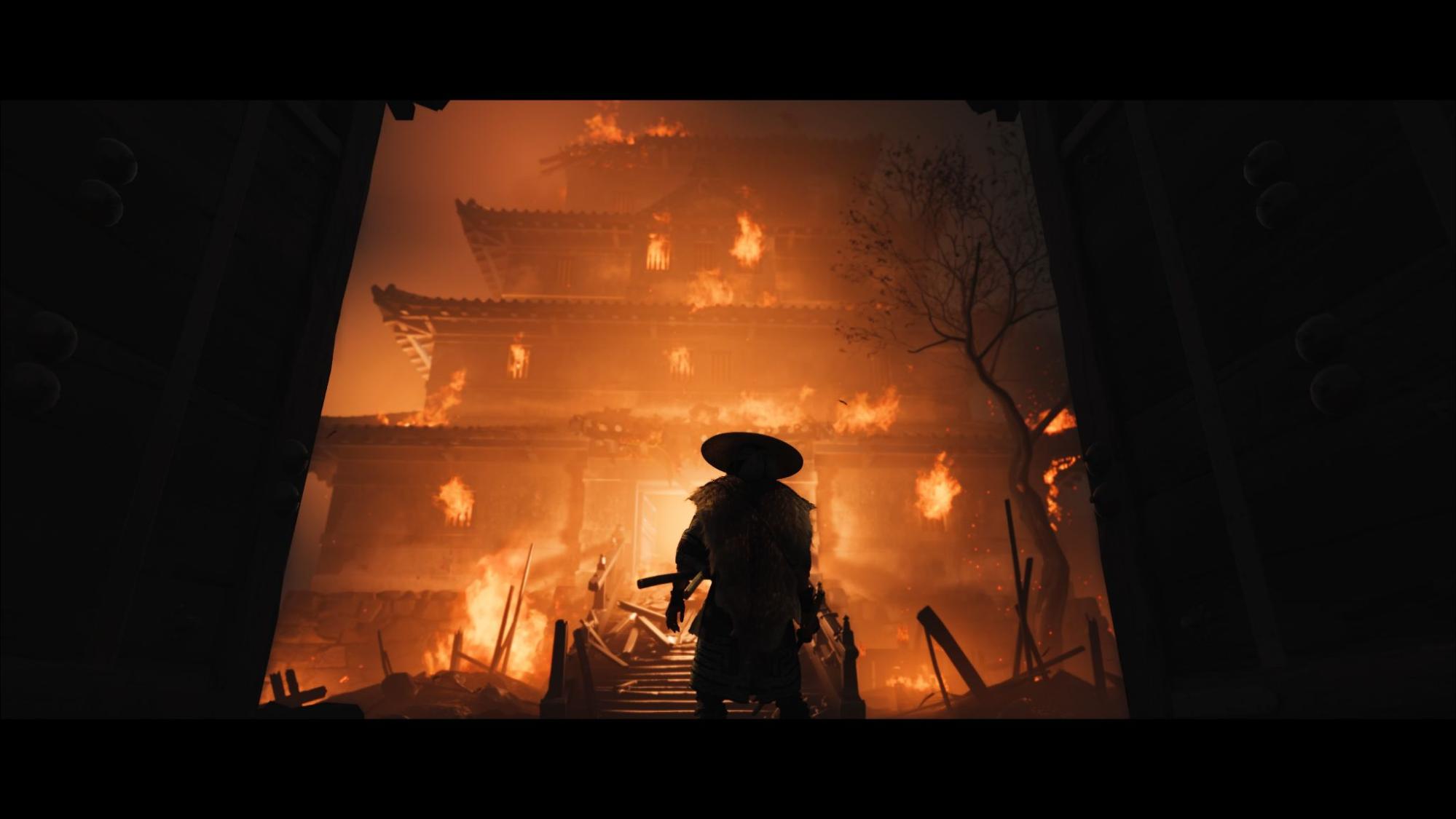 Warrior approaches a castle engulfed in flames in Ghost of Yotei