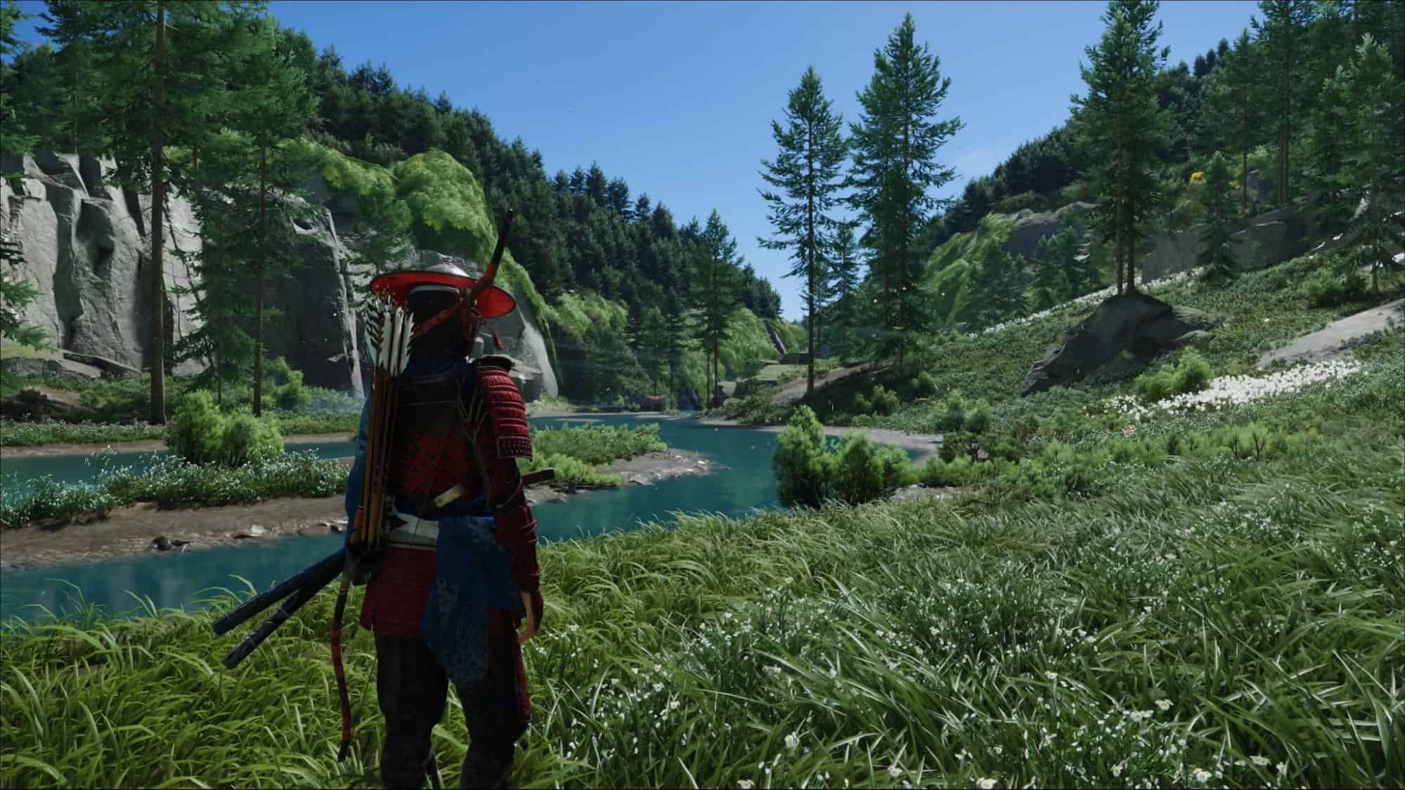 Warrior overlooks a lush river valley in Ghost of Yotei