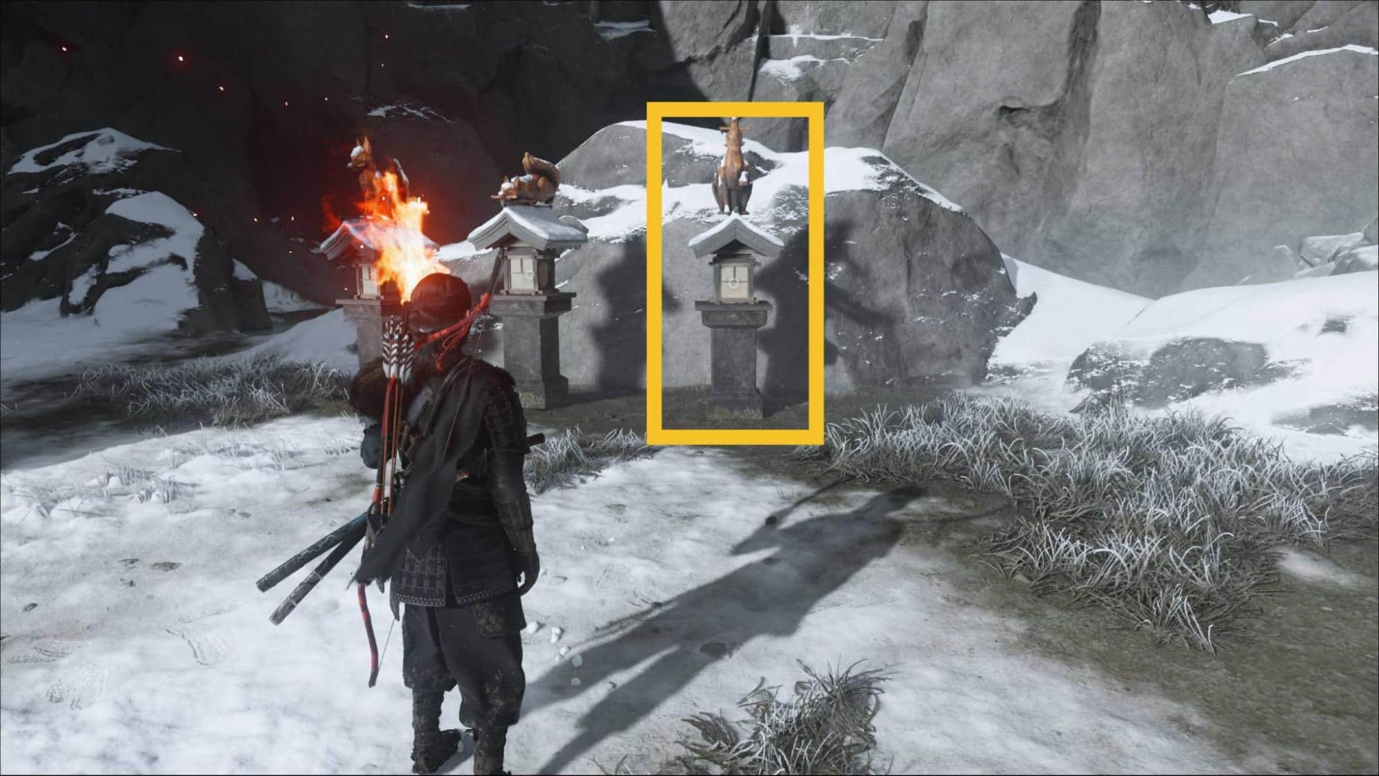Player stands before fox lanterns at the Ghost of Yotei Snow Drift Springs Shrine, with the correct one highlighted in yellow