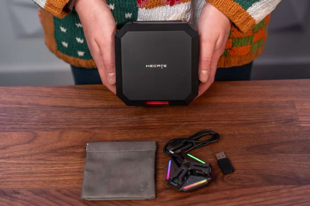 The reviewer wearing the Hecate hX05 earbuds