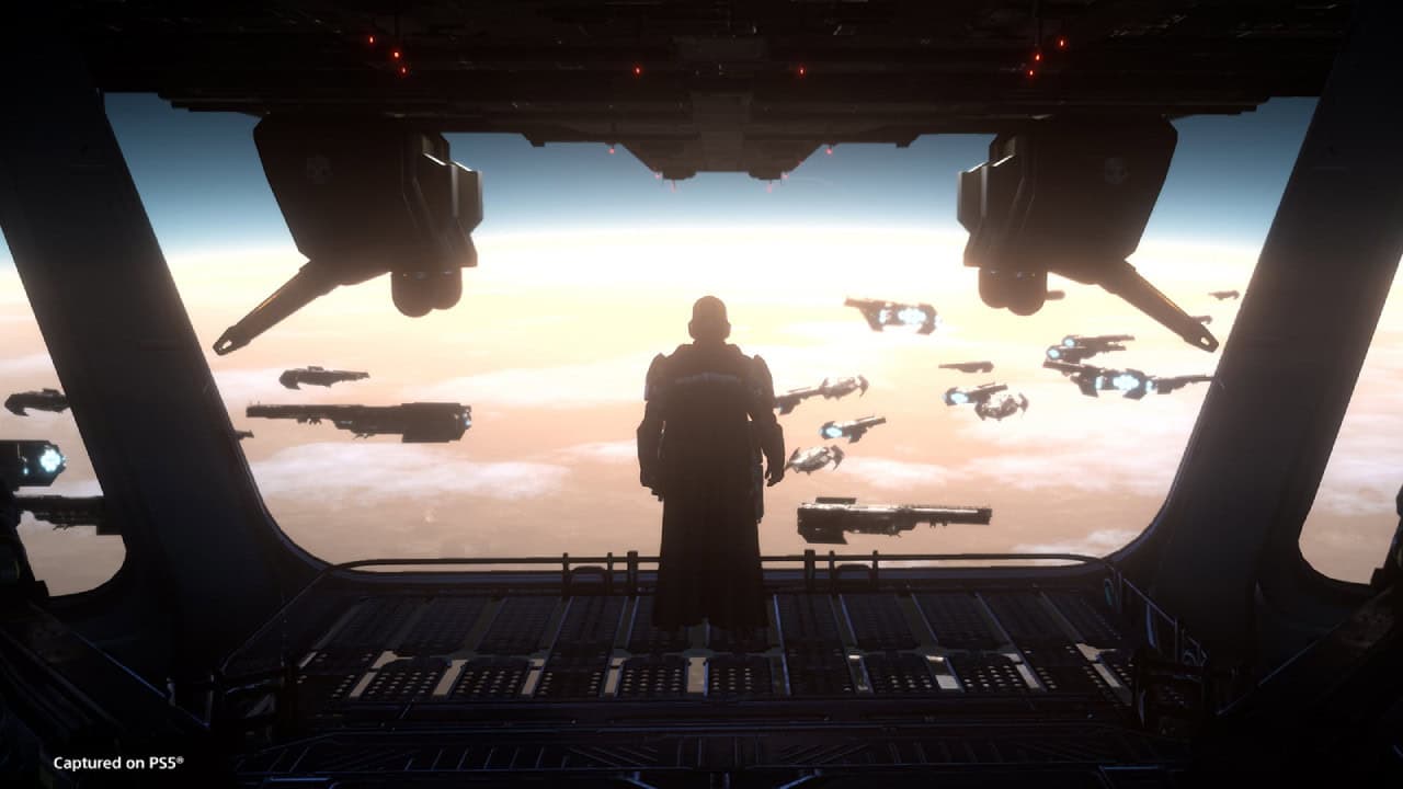 A person stands in the open cargo bay of an aircraft, overlooking a fleet of flying ships above the clouds, and they're not wrong, with "captured on ps5" visible in the corner