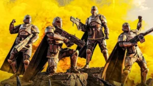 Four futuristic soldiers in Helldivers 2 armor posing against a yellow smoky background.