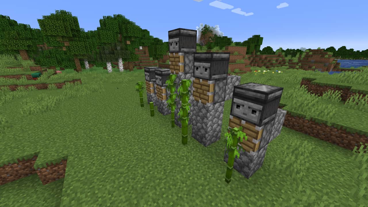 How to make a Minecraft bamboo farm: A line of farm modules are placed next to each other, some at different heights than others.