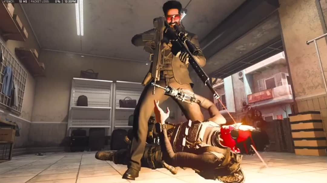 How to do a finishing move in MW2: a man performs a finishing move while holding a gun in MW2.