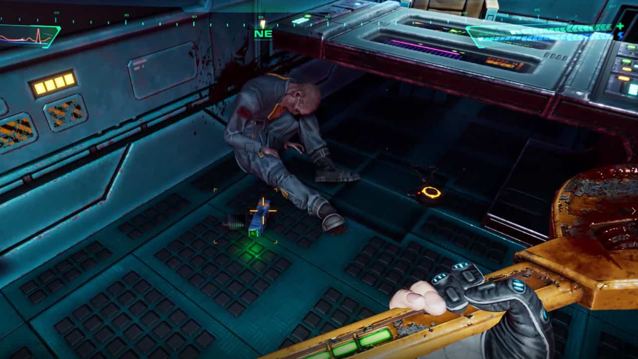 How to get guns early in System Shock: A Minipistol lying on the ground next to a corpse.