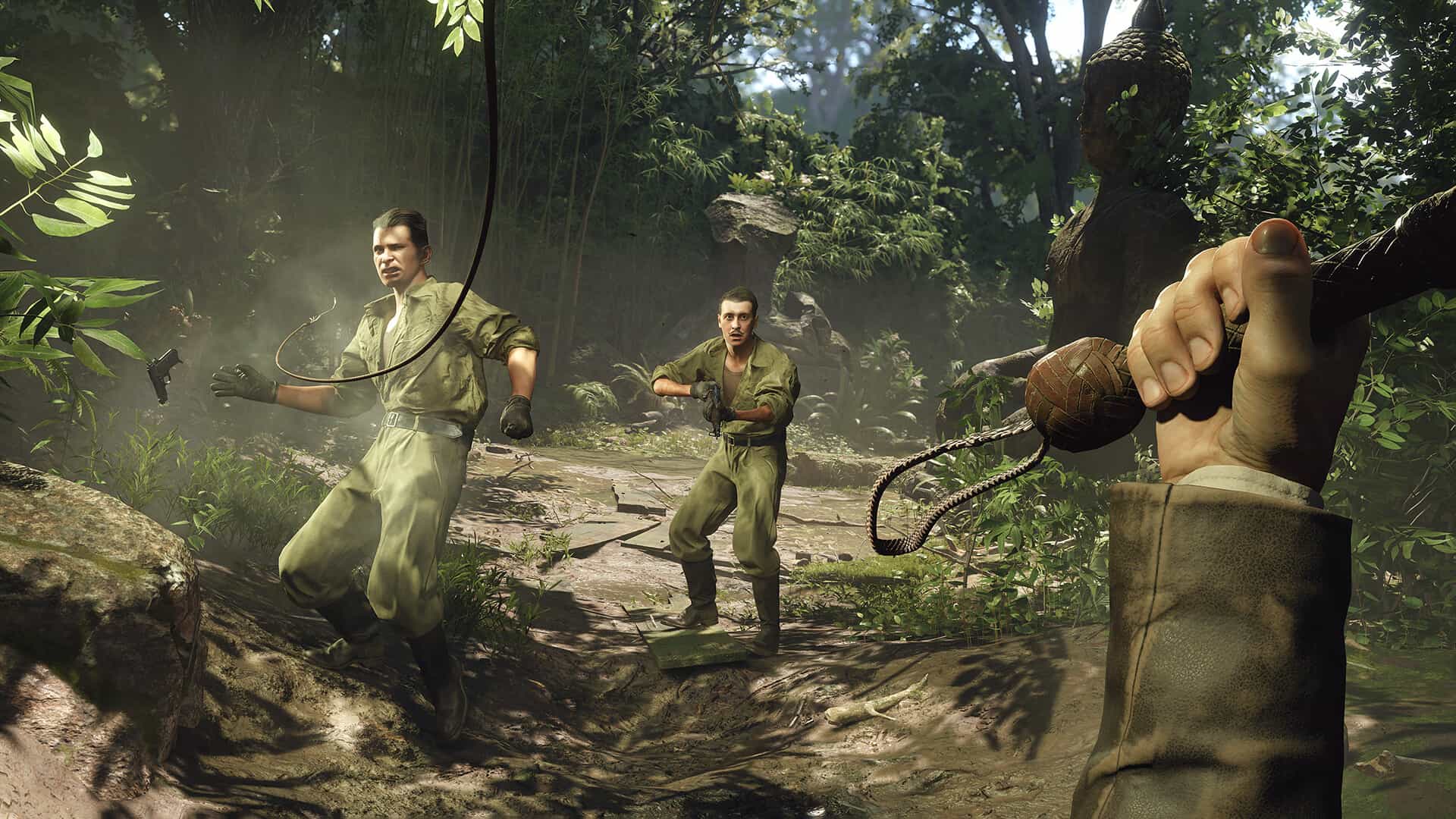 First-person whip attack against soldiers in dense jungle scene from Indiana Jones and the Great Circle