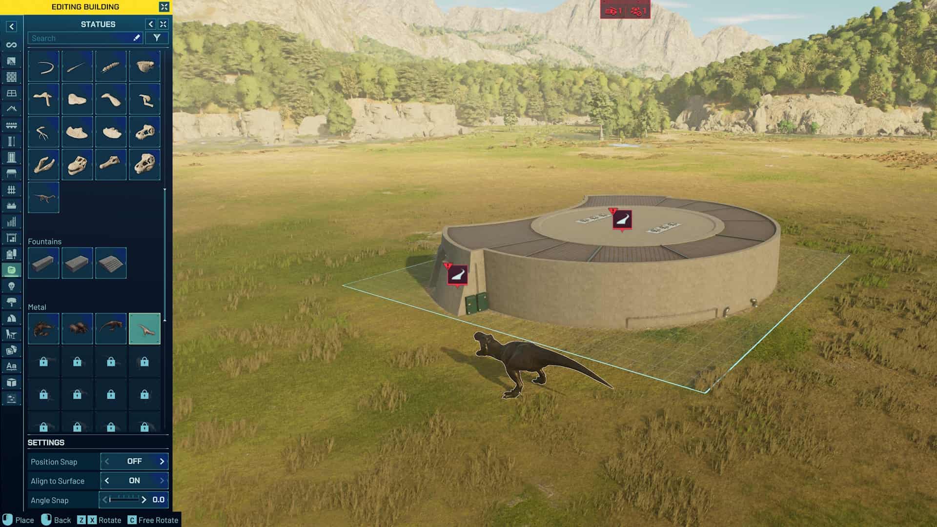 A player customizes a dinosaur exhibit in Jurassic World Evolution 3, adding decorative statues and metal figures near an enclosure in a grassy valley.