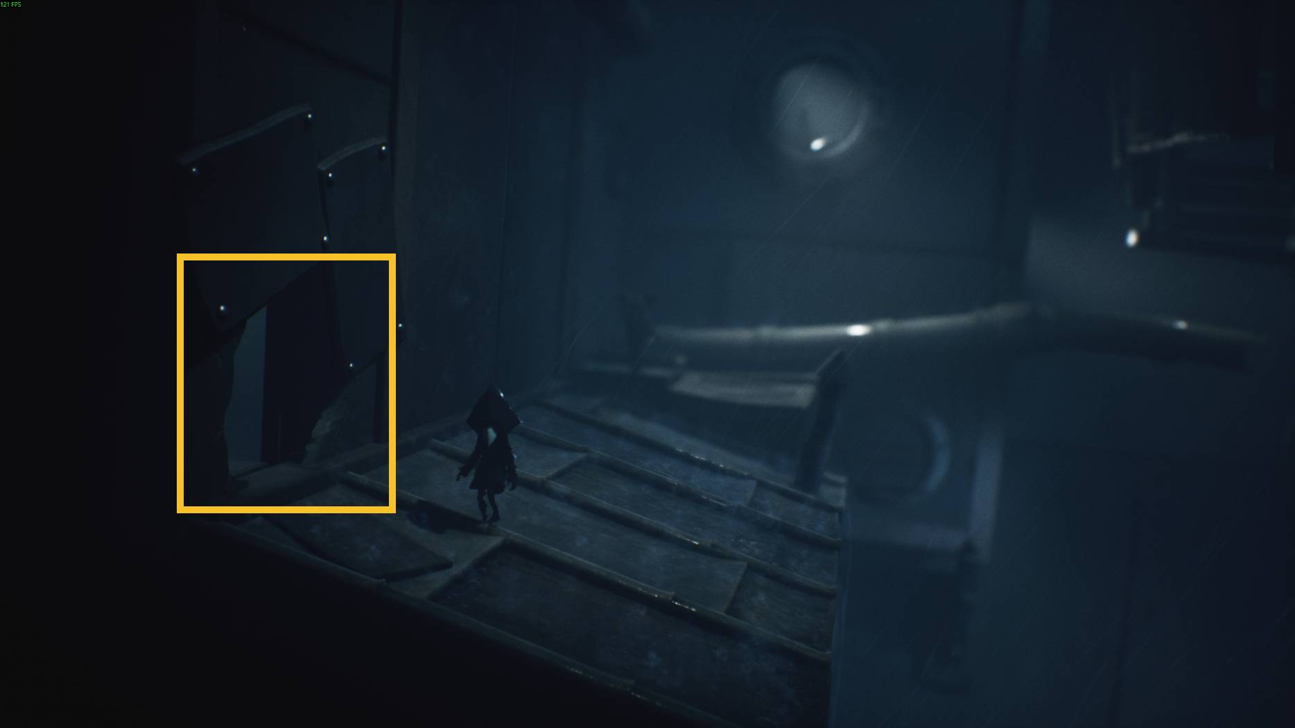 Little Nightmares 3 screenshot of a rooftop escape in the rain, with a small hidden figure in the shadows by the wall.