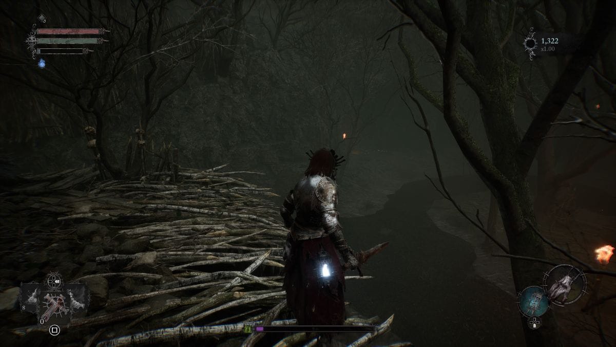 A character is walking through the woods in a video game, trying to help the petrified woman.